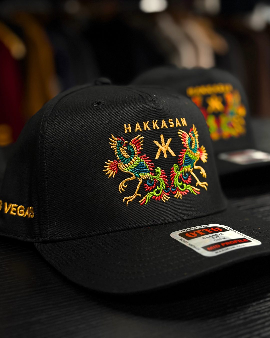 Black mid-profile snapback with a multicolor embroidered design on the front and "Las Vegas" stitched on the side.